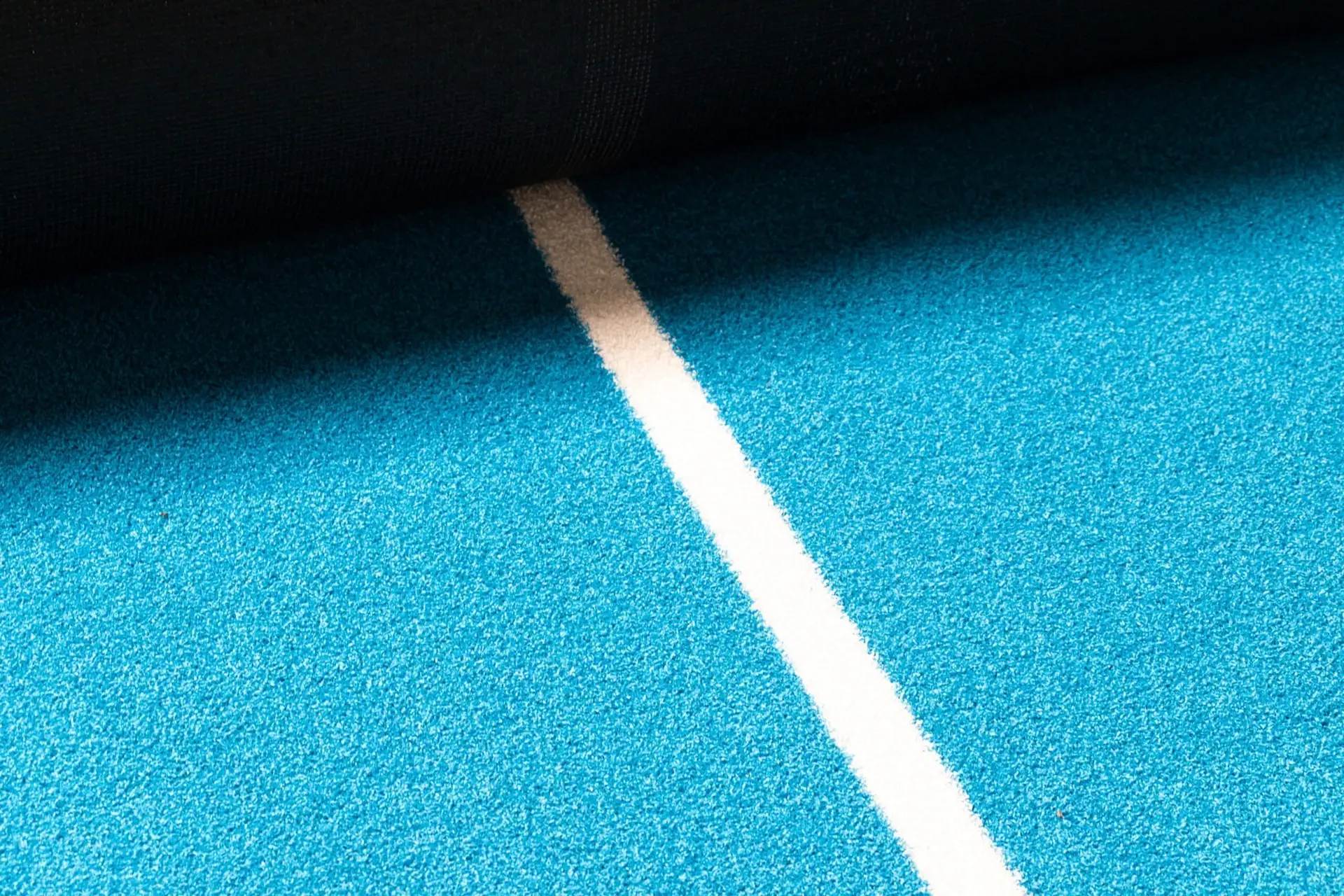 Blauw kunstgras van een padelbaan
